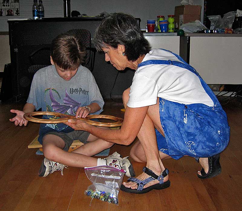 Candi Cosgrove working with a student